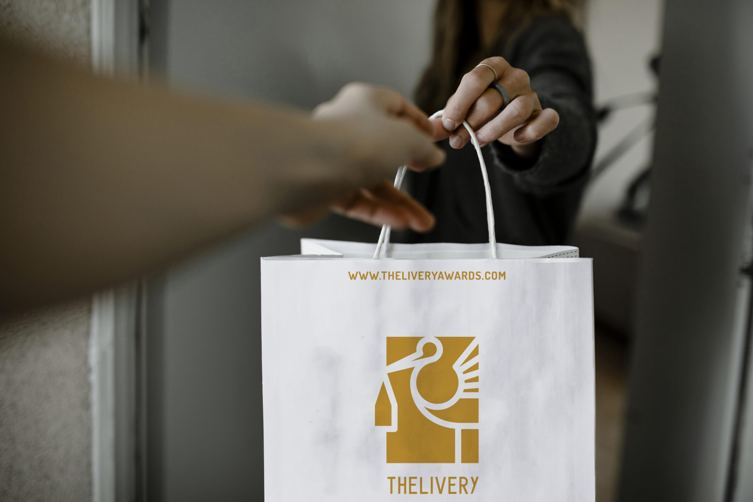 Woman receiving food delivery during the coronavirus pandemic